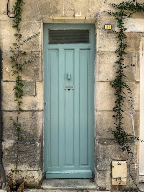 Elegant light blue door in stone